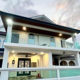 Three Homestay, hotelli kohteessa Perai