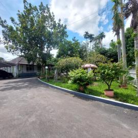 Grand Syariah Guest House Humanitas，先達的飯店