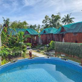 Nirvana bamboo houses & dive centre, hotel di Moalboal