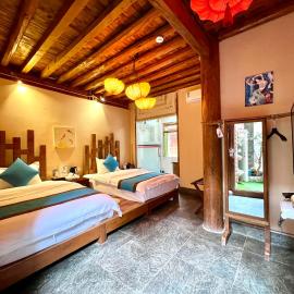 Juxian Boutique Homestay, hótel í Lijiang