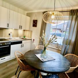 Nessmersiel, Renovierte Erdgeschosswohnung mit Garten, in Deichnähe, Wallbox,