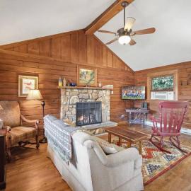 Log cabin on peaceful river