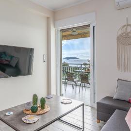 Fantastic sea view one-bedroom apartment - Lagonissi, hotel in Lagonissi