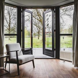 luxe vakantiehuisje - sauna - natuur - strand, hotel u gradu Ewijk