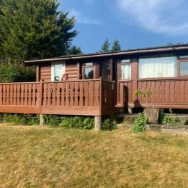 Snug and cosy log cabin., hotel in Trawsfynydd