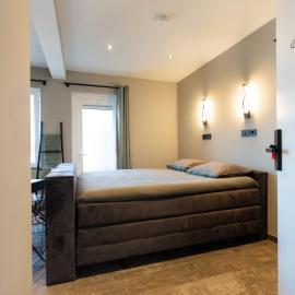 Luxe kamer met stoomsauna bij B&B Gezond aan Zee - Toegang bad en buiten Wellness tegen meerprijs, hotel i Ouddorp
