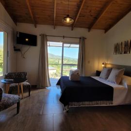 Lo de Almada Cabañas&Suites, hotel in Huerta Grande