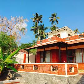 The Ixora - A Boutique Homestay, hotel in Varkala