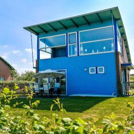6pers. Lauwersmeer Lakefront. Nirvana house with sauna, pellet stove