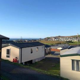 Experience Coastal Bliss in Our Modern 2019 Sea Viev 2 Bedroom static caravan at Clarach Bay Holiday Village!, khách sạn ở Aberystwyth