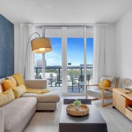 Sunset Oasis with 2BR, Balcony, Pool, Perfect Getaway