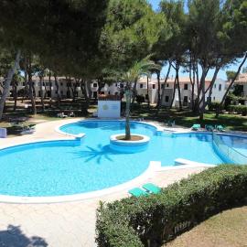 Apartamento Playa Xoriguer con piscina y jardin