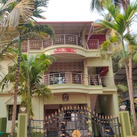 Trinity Villa - Home Stay, hotel i Honāvar