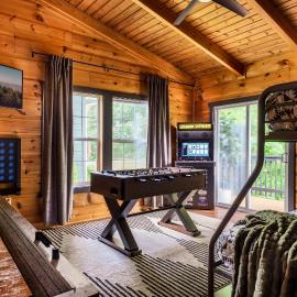 The Copper Bird Mid Century Hot tub Arcade Gameroom Rock Climbing wall