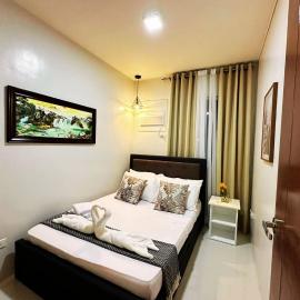 Spacious 2BR Condo unit with FREE Gym, Parking & FREE Pool up to 6pax - B2 1Nambulite