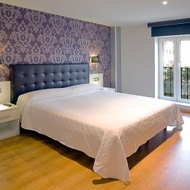 Apartamentos Spa Villa Pasiega, מלון בהוזנאיו