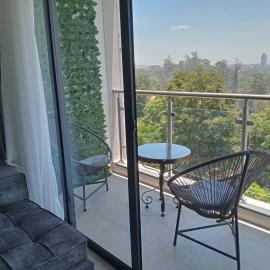 Tranquil 7th floor Apartment near Art Caffe Market, готель у місті Найробі