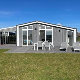 Chalet in Zeeland by Scenic Pond