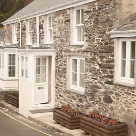 포틀로에 위치한 호텔 Cottages at the Lugger
