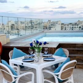 Luxury PH with rooftop pool in Mellieha by Homely