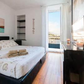 Trilocale sulla Spiaggia - Parcheggio Privato: Cenova'da bir otel