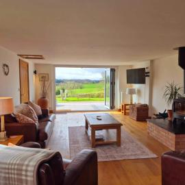 Poplars Cottage, hotel Uskban
