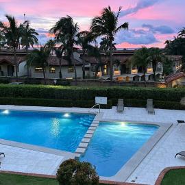 Stylish 2-Bedroom Beach Condo with Ocean-View Deck, Lush Pool Area & 2-Minute Walk to Flamingo Beach
