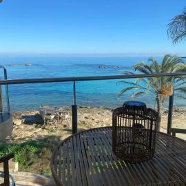 Attico fronte mare Espardell19 Es Pujols, hotel a es Pujols