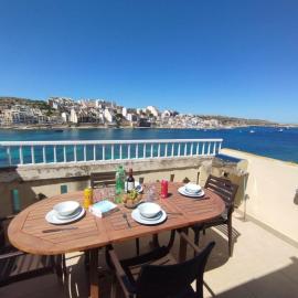 Blue Harbour Seafront with large terrace with panoramic sea views - by Getawaysmalta