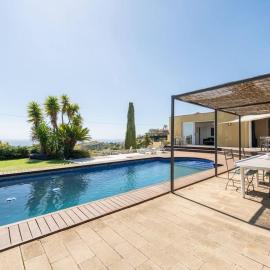Casa Mar Blava con piscina comunitaria junto Barcelona Centro, hotel in Alella