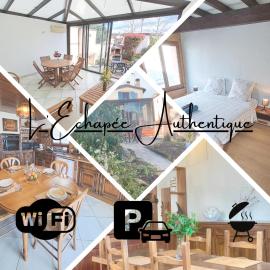 L'échappée authentique- Maison centre-ville- véranda climatisée-jardin