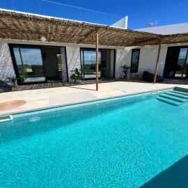 Villa con piscina en Golf Isla Canela Links, хотел в Аямонте
