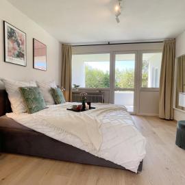 Bungalow Wohnung mit Südterrasse in Seenähe, khách sạn ở Meersburg