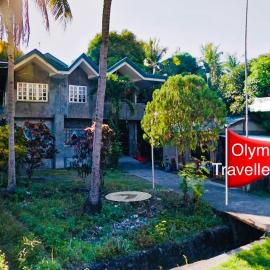 Olympia Travellers INN, hotel en Looc