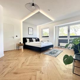 Modern Apartment - für Freunde & Familien, stadtnah, Parkplatz, E-Ladestation, Gitterbox für Fahrräder, Fitnessstudio, digitale Gästemappe mit Restaurant- und Unternehmenstipps, Hotel in Koblenz