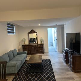 Spacious 2 BR & Kitchen Basement Apartment near Airport