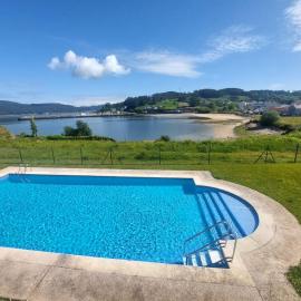 Apartamento encima del mar, piscina y terraza
