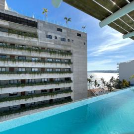 Casa Las Palmas - Condos by the Beach with Rooftop Pool