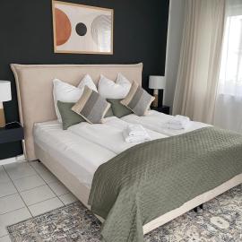 Moderne Wohnung mit Terrasse & Parkplatz; Nähe BWZK & Amazon