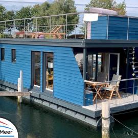Hausboot LUMME - Huus & Meer, hotel in Großenbrode