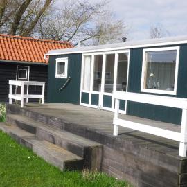 Hoeve Zorglust, salonwagen voor 2 personen met extra slaapkamerhuisje voor 2 - 3 kinderen, hotel a Koudekerke