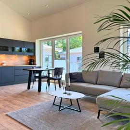 Haus Kiebitz 2 OG - Neubau-Apartment mit Infrarot-Sauna, Balkon & 600 m zum Strand, hotel u gradu 'Varel'