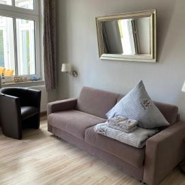 Ferienwohnung 4 Rosenbogen - Familienwohnung mit Wintergarten und Terrasse
