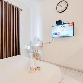Simply and Nice Studio at Sky House Alam Sutera Apartment By Travelio