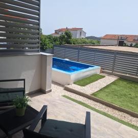 Apartments Relax, hotel in Rogoznica