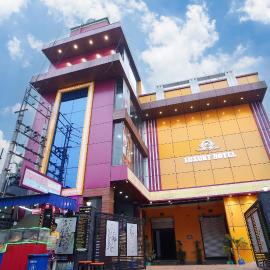 PS Luxury Hotel, מלון בBaharampur