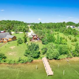 Riverfront Cheboygan Home w/ Dock ~ 4 Mi to Town!, hotel a Cheboygan