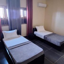 Deluxe Twin Beds Bedroom in Lome Togo
