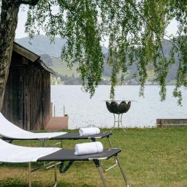 Alte Fischerei - Apartments am See، فندق في Scharfling
