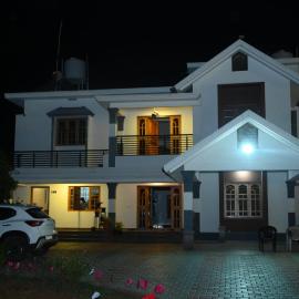 Bridge Point Home Stay, хотел в Кушалнагар